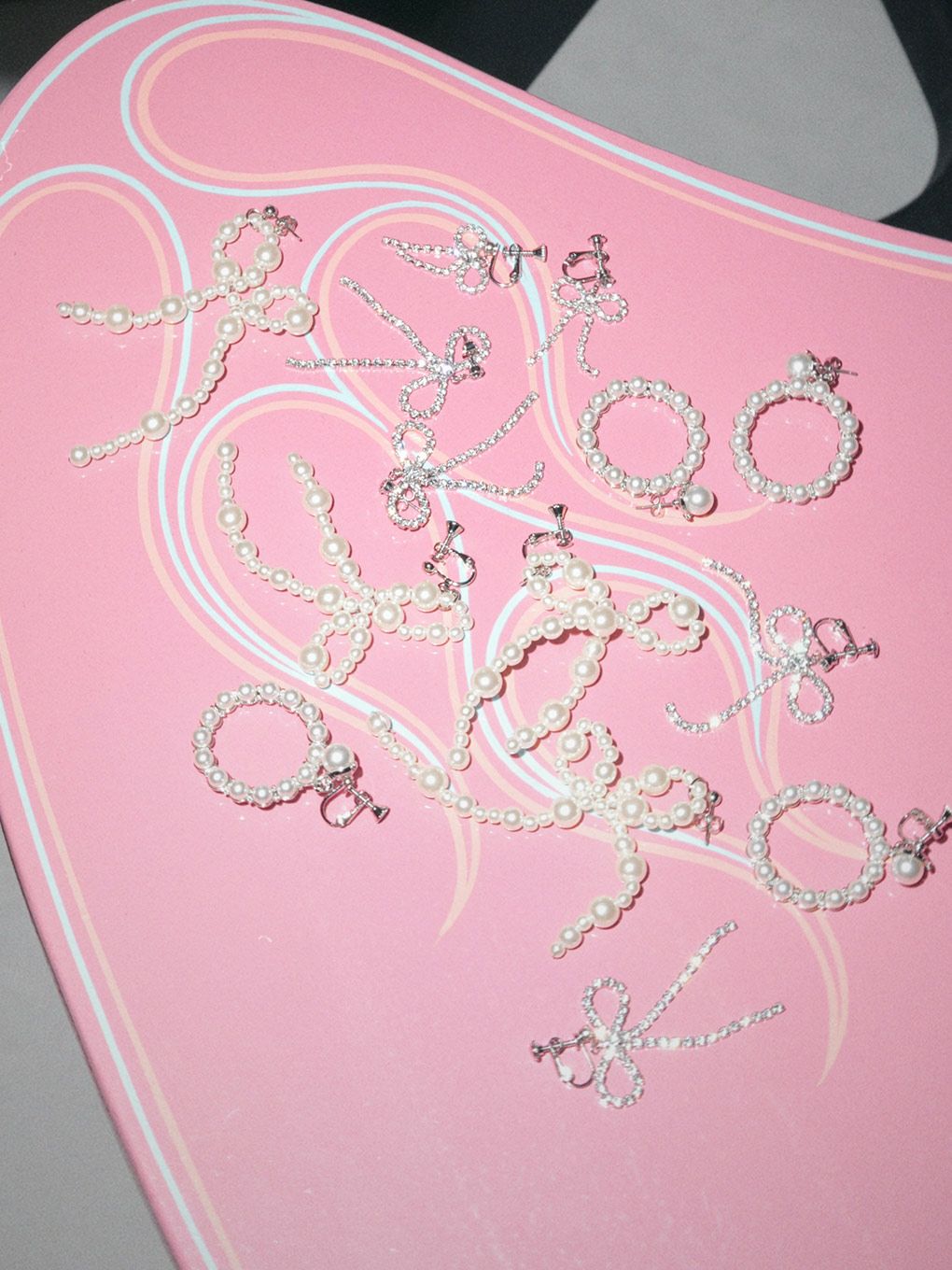 【BUBBLES】ビジューリボンピアス